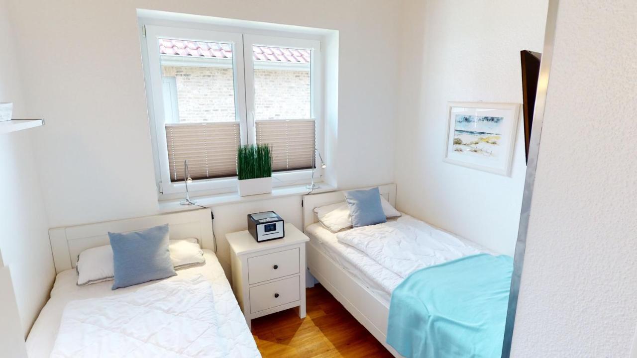 Feriendorf Suedstrand Haus 36 بيلزيرهاكين المظهر الخارجي الصورة